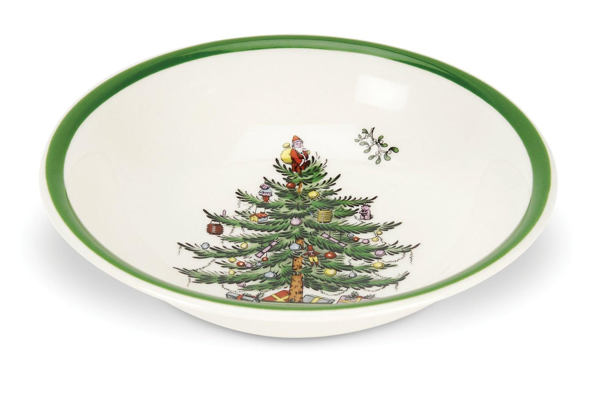 Angled top view of 8 inch Ascot cereal bowl showing Spode Christmas Tree motif and green rim on white background