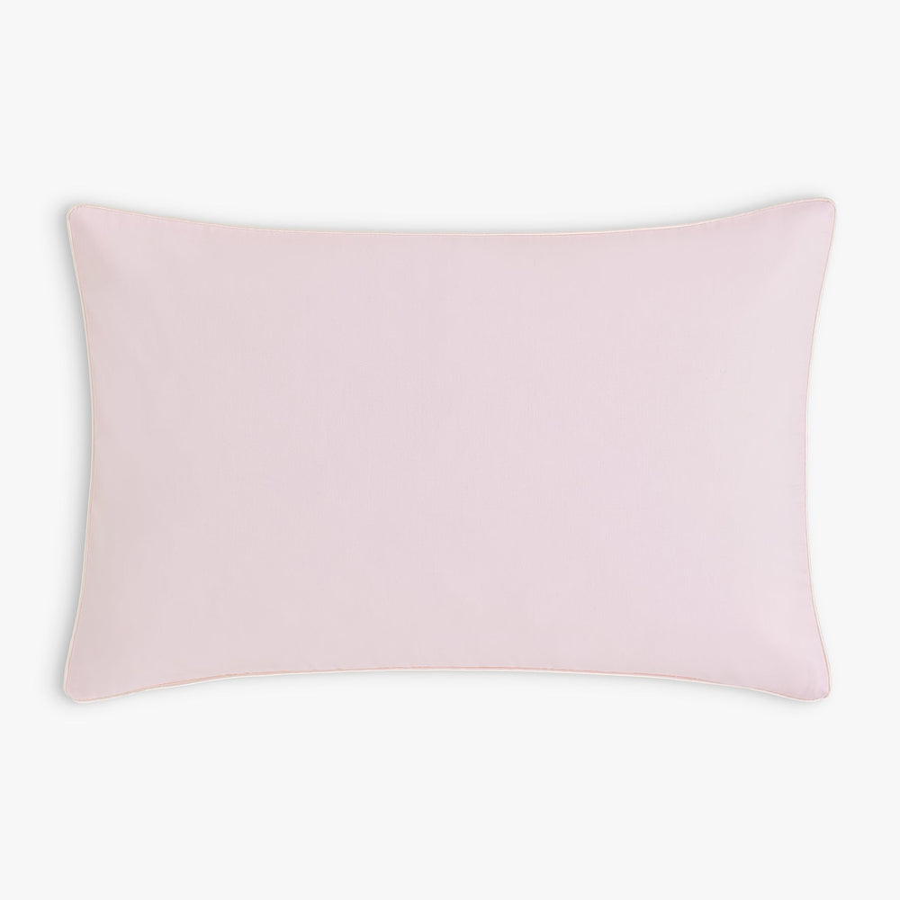 Backside of toddler pillow, solid pink. 