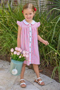 Little English traditional children's clothing. Classic dress for toddler girls in red windowpane with peter pan collar and tulip embroidery