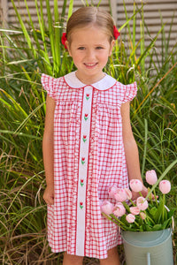 Little English traditional children's clothing. Classic dress for toddler girls in red windowpane with peter pan collar and tulip embroidery