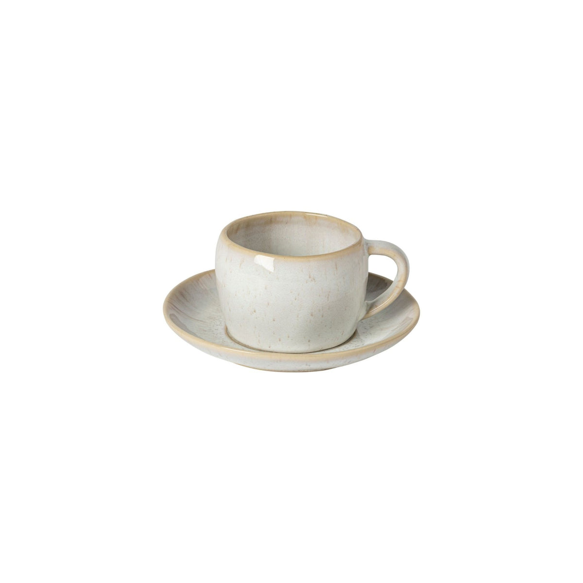 Front view Eivissa sand beige tea cup on matching saucer showcasing organic shape and reactive glaze on white background
