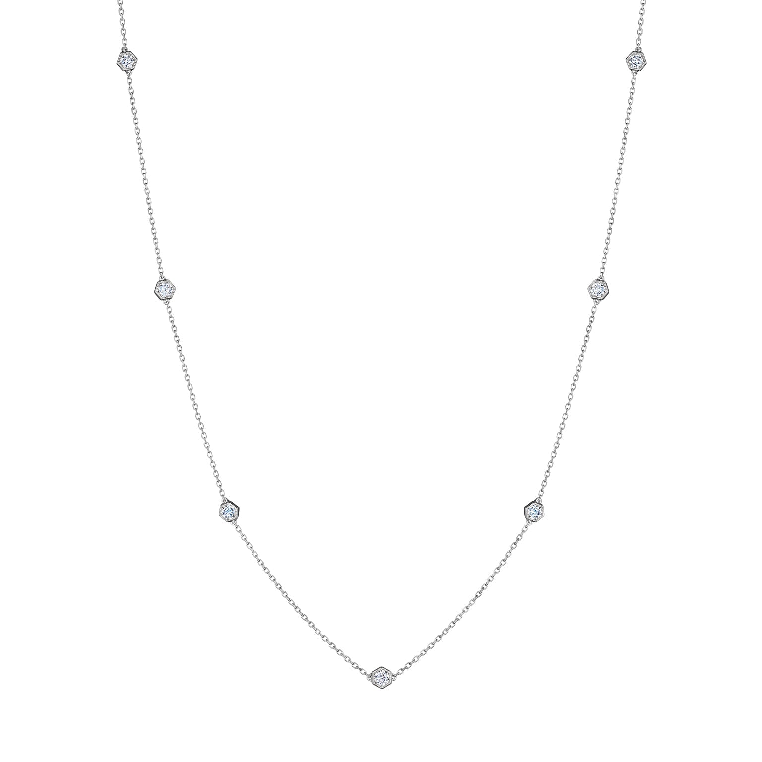 Small Serpentine Station Necklace in white gold, featuring hexagon bezel-set diamonds spaced along a fine chain, displayed on a white background.