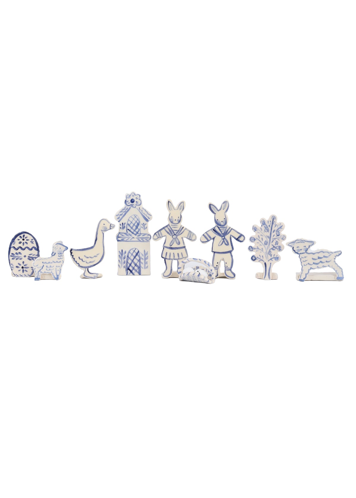 Front view of Easter Vignette in Blue and White, Set of 9 showcasing nine hand-painted figures with a white background