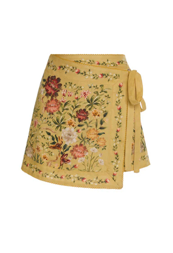 Front view of Luna Mini in Paramo showcasing a floral wrap silhouette and side tie on a white background