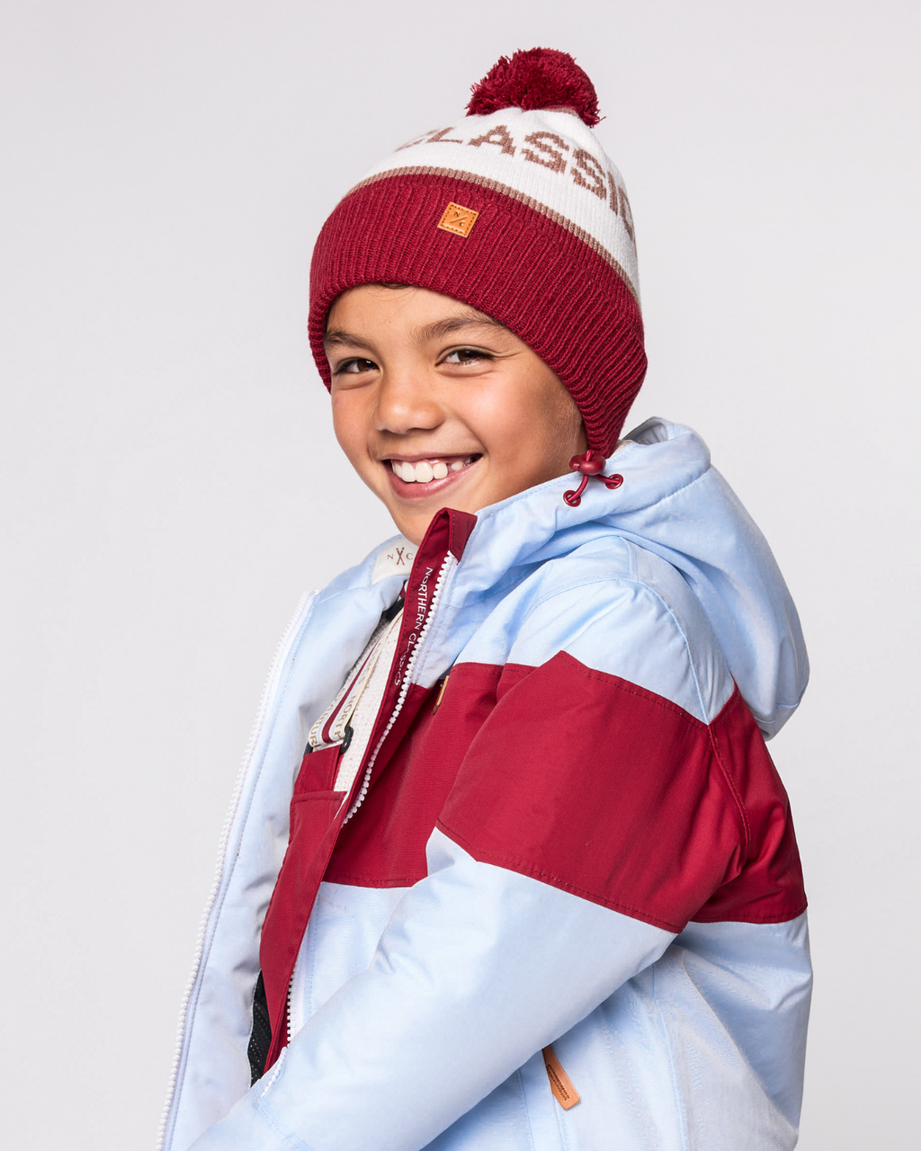 Northern Classics Knit Pom Hat in Heritage Red and Winter White