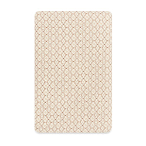 Front view of Mini Crib Sheet in Autumn Star showcasing a repeating beige geometric pattern on white background