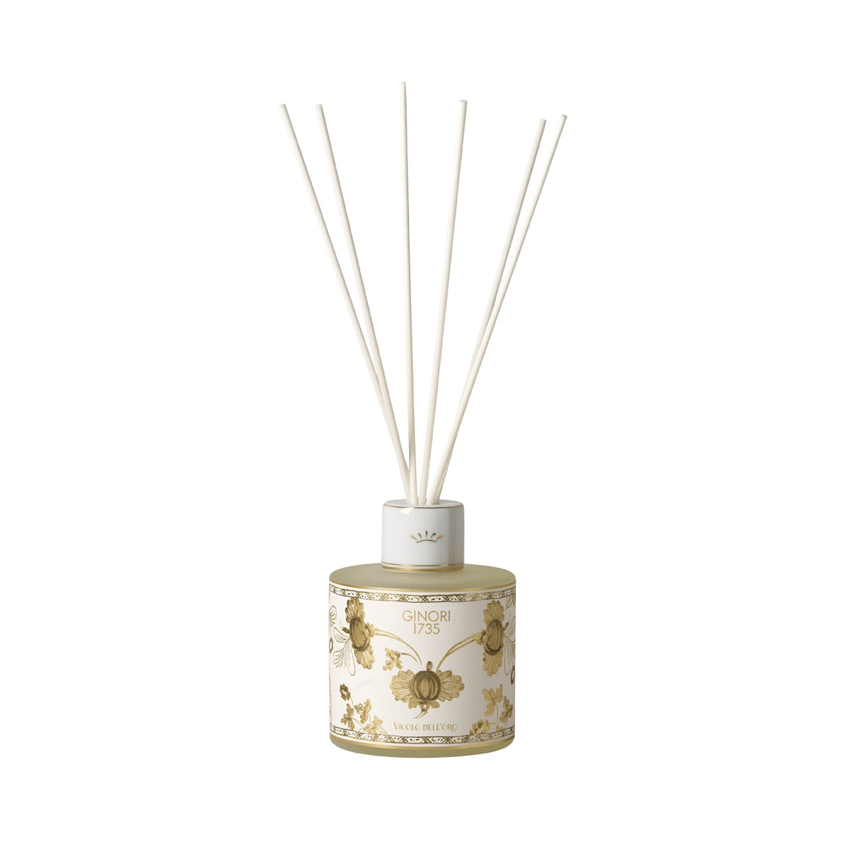 Front view of Oriente Italiano Room Diffuser in Aurum showcasing fine porcelain with floral gold decoration and reeds against a white background