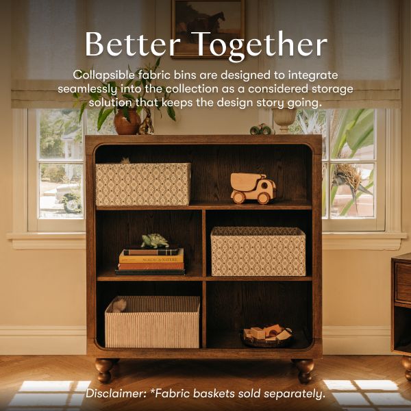Toffee Astre assembled bookcase with fabric baskets in a warm room with Better Together text and baskets sold separately
