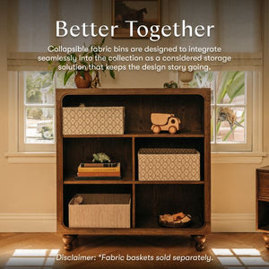 Toffee Astre assembled bookcase with fabric baskets in a warm room with Better Together text and baskets sold separately