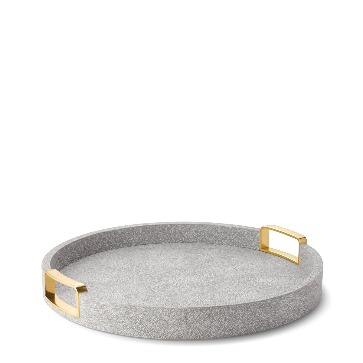 Three-quarter top view of Carina Shagreen small round tray in dove showing embossed shagreen texture and rectangular brass handles on white background