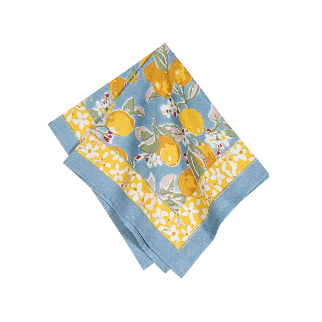 Top view of Citron Napkins in Bleu and Yellow, Set of 6 showcasing citrus and floral print on white background