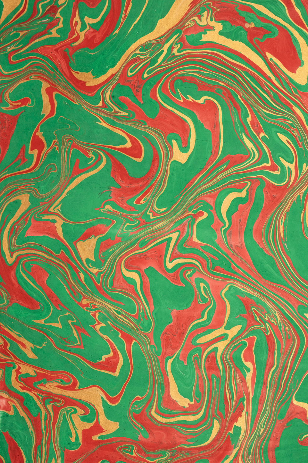 Hand marbled holiday wave pattern gift wrapping paper detail