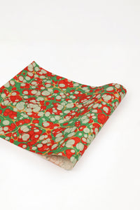 Green, red, and white hand marbled Christmas gems gift wrapping paper sheet