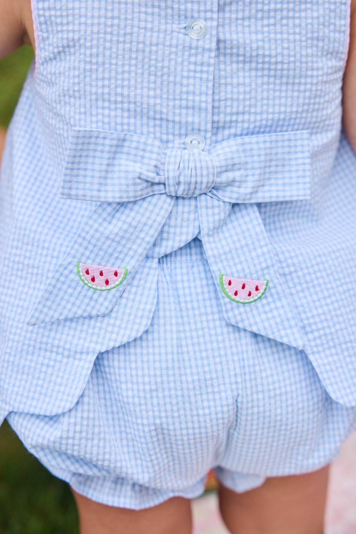 Little English traditional children's clothing.  Blue gingham set for baby girls with scallop bow back top with all-over watermelon embroidery and coordinating ruffled bloomer