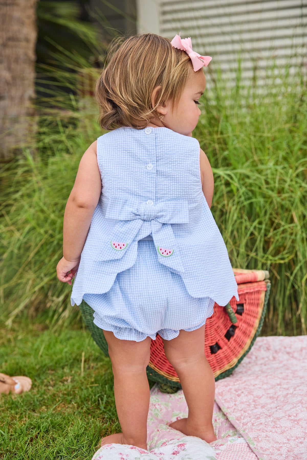Little English traditional children's clothing.  Blue gingham set for baby girls with scallop bow back top with all-over watermelon embroidery and coordinating ruffled bloomer