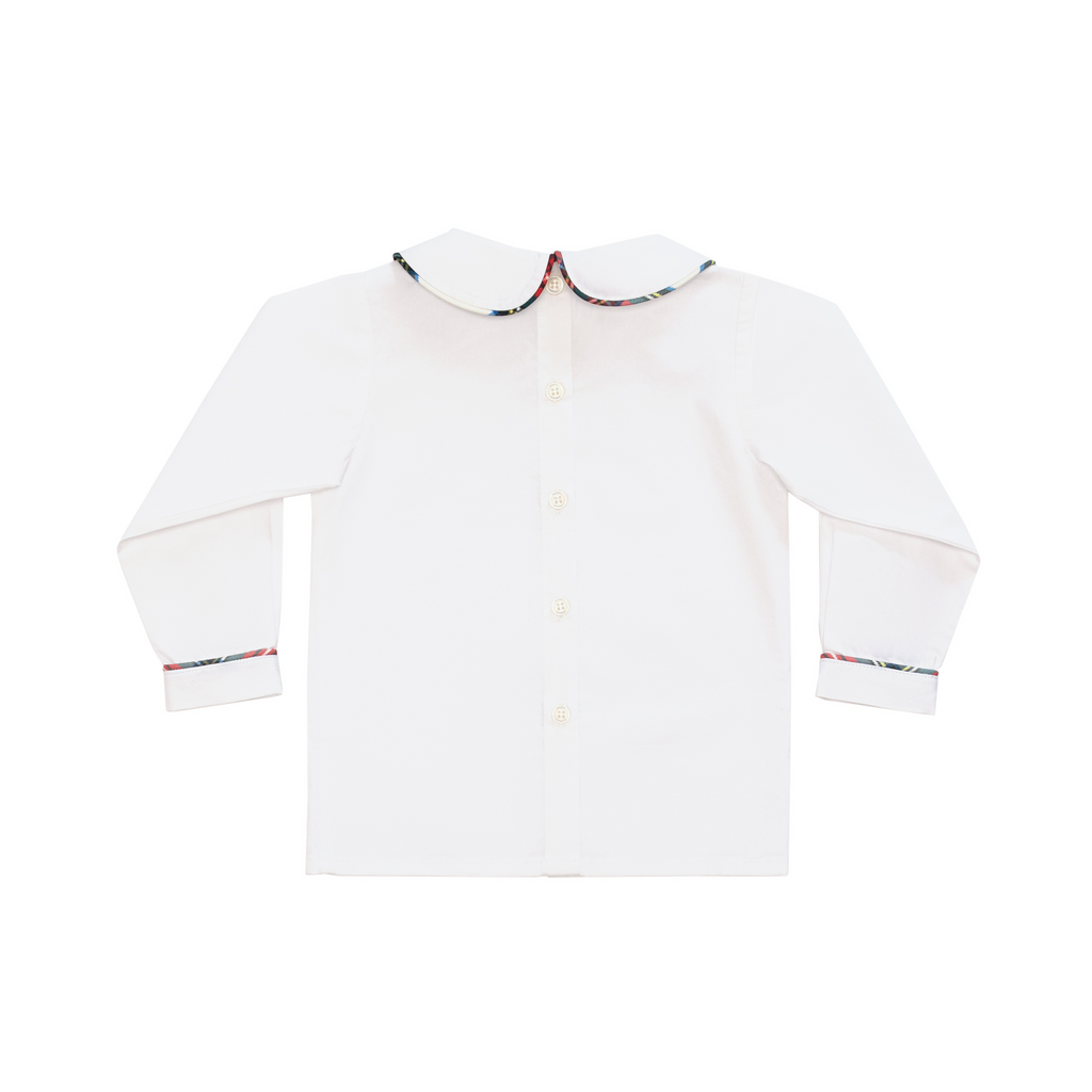 Classic white Peter Pan collar top highlighted with bold Townsend Tartan trim. A signature holiday piece from Henry Duvall’s Holiday Collection.