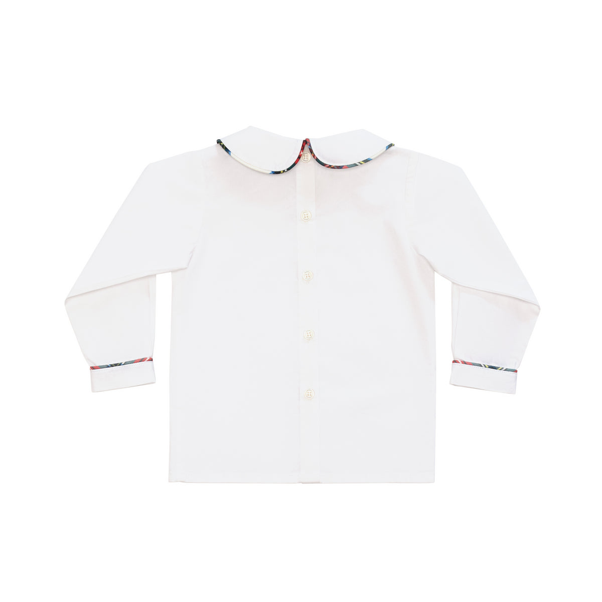 Classic white Peter Pan collar top highlighted with bold Townsend Tartan trim. A signature holiday piece from Henry Duvall’s Holiday Collection.