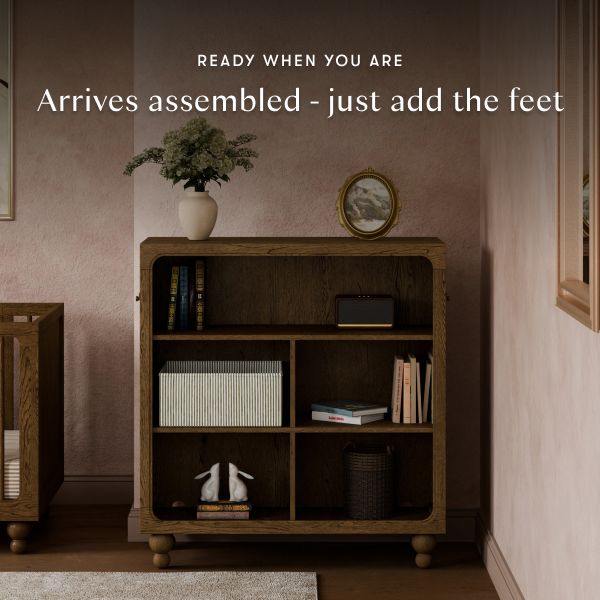 Front view of Astre Assembled Bookcase by Nate Berkus in Toffee with open shelves; ready when you are, just add the feet
