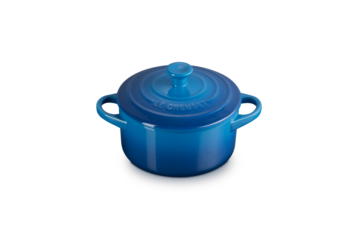 Front view of Mini Round Cocotte in Marseille showcasing blue glazed stoneware, lid, and side handles on a dark background