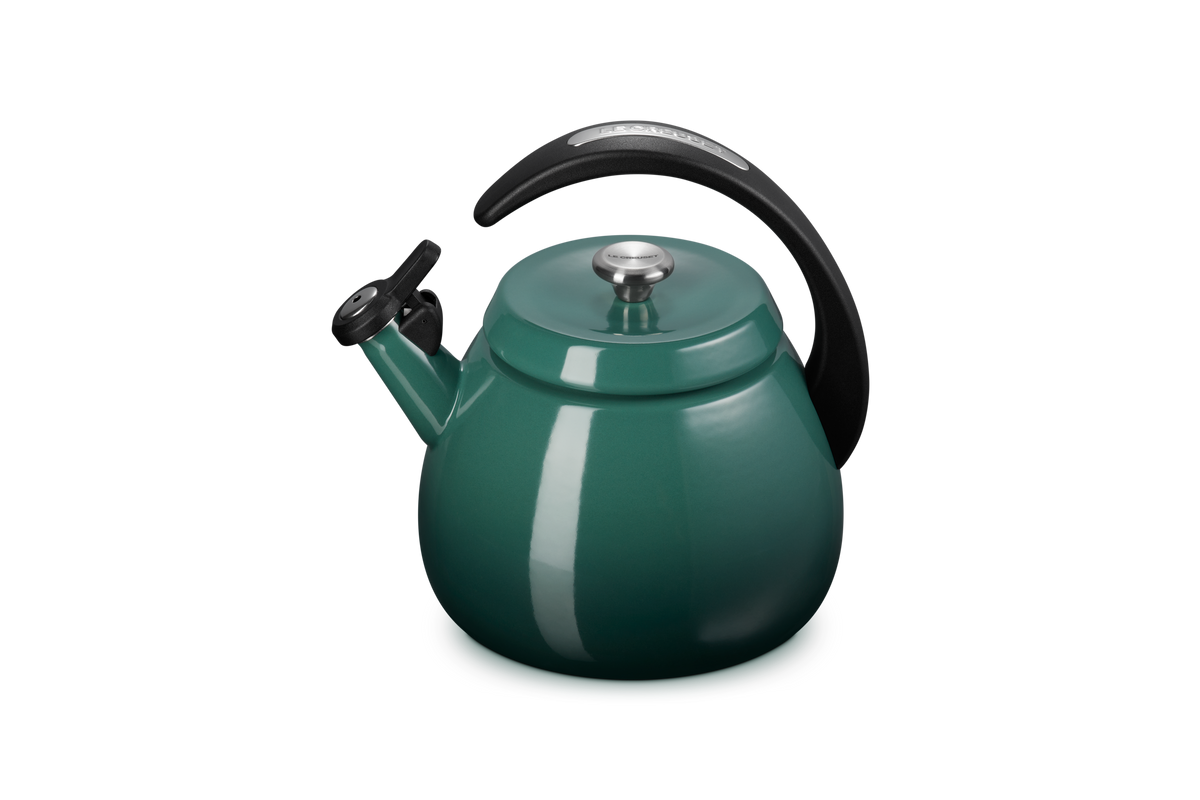 Close-up view of Cloche Kettle in Artichaut showcasing glossy enamel and halo-style handle on a white background