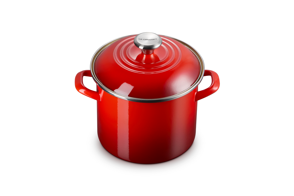 Close view of 6 qt Stockpot in Cerise showcasing its lid, handles, and red porcelain enamel finish on a dark background