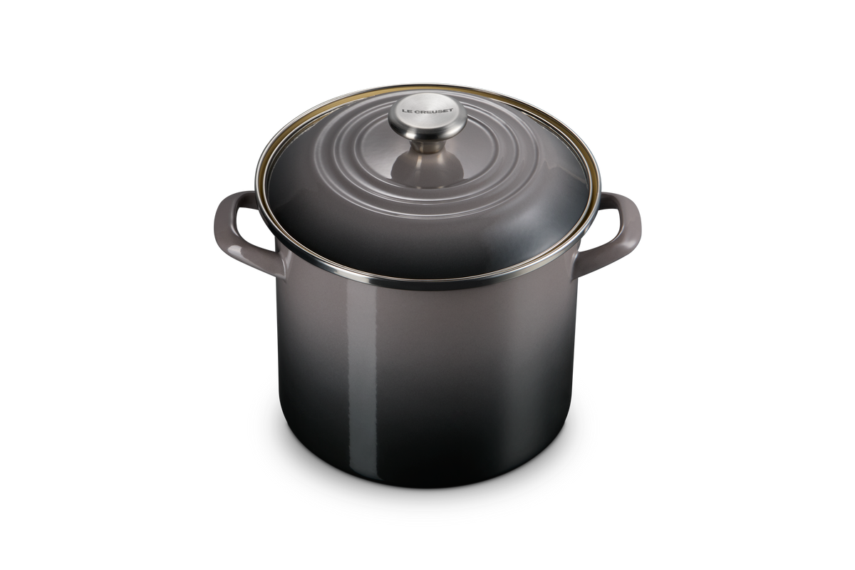 Front view of 8 qt. Stockpot in Oyster showcasing its fitted lid and side handles with a dark background