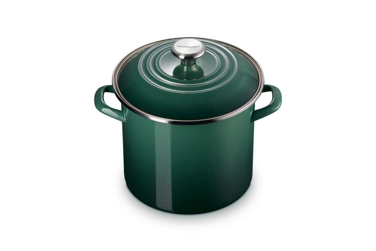 Close-up view of 8 qt. Stockpot in Artichaut showcasing its lid and metal knob against a black background