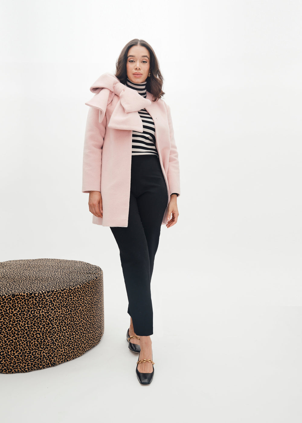 Front view of Lizzie Pant Stretch Wool in black on model, slim tapered ankle-length fit against white studio background
