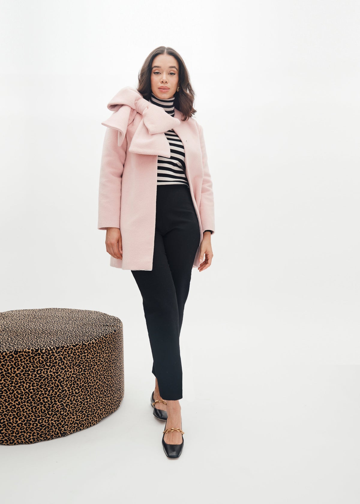 Front view of Lizzie Pant Stretch Wool in black on model, slim tapered ankle-length fit against white studio background