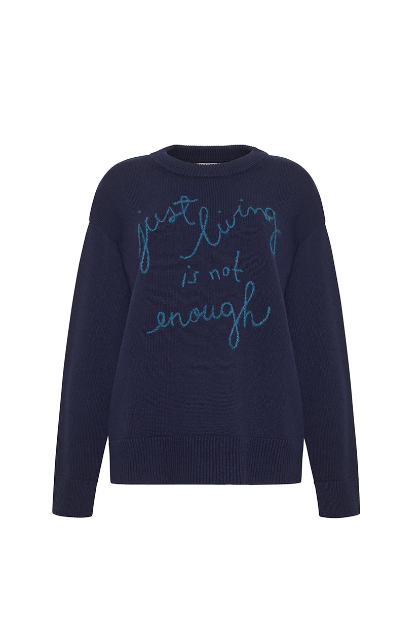 Front view of Just Living Is Not Enough crewneck, navy knit with teal embroidered script, oversized boxy fit and ribbed trim on white background