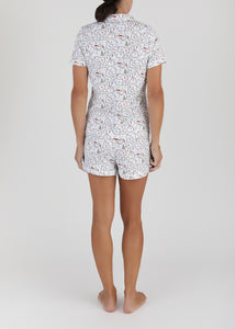 Back view of women’s Nutcracker Suite short pajama set showcasing a short sleeve top and matching shorts with all-over print
