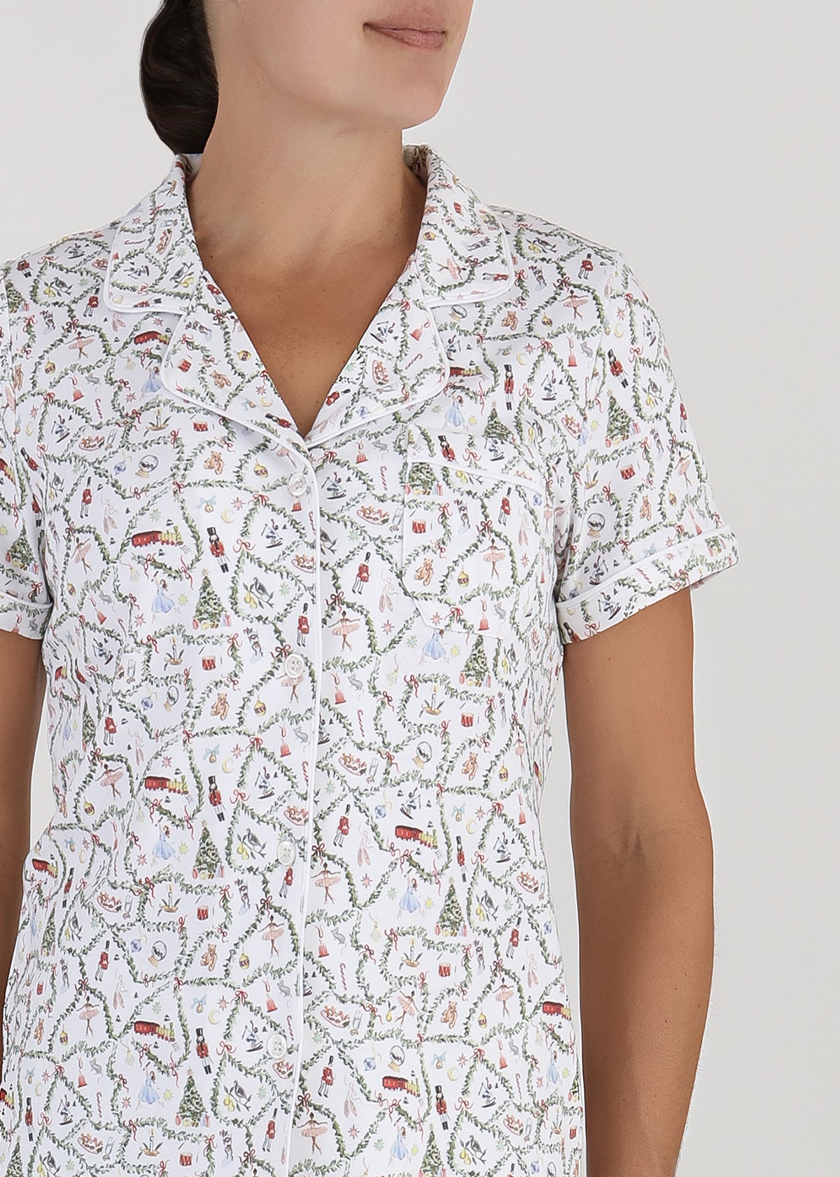 Front view of Women’s Nutcracker Suite Short Pajama Set showcasing the printed short-sleeve top against a gray background