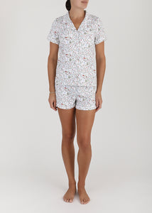 Front view of Women’s Nutcracker Suite Short Pajama Set showcasing a patterned top and matching shorts on a model
