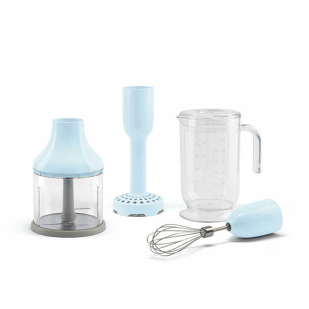 Front view of SMEG hand blender accessory set in pastel blue showing wire whisk, chopper bowl with nonslip base, mashing attachment, and graduated beaker