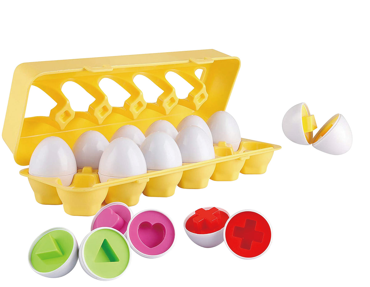 Angled view of Shape Sorter Eggs 12 Piece playset with yellow tray, white eggs, and colorful shape pieces