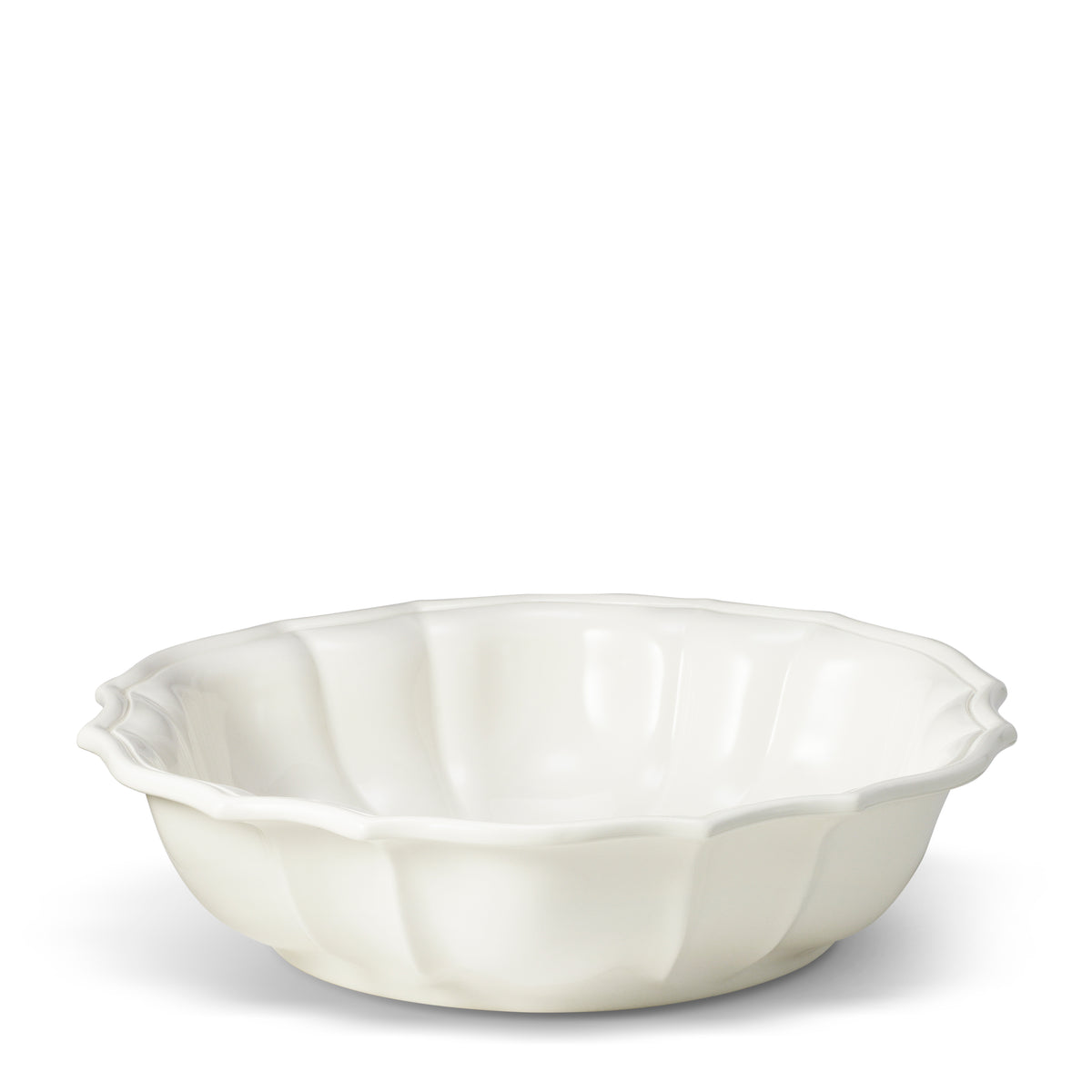 Front view of Arno Serve Bowl in Cream showcasing rosette-style trim with a white background