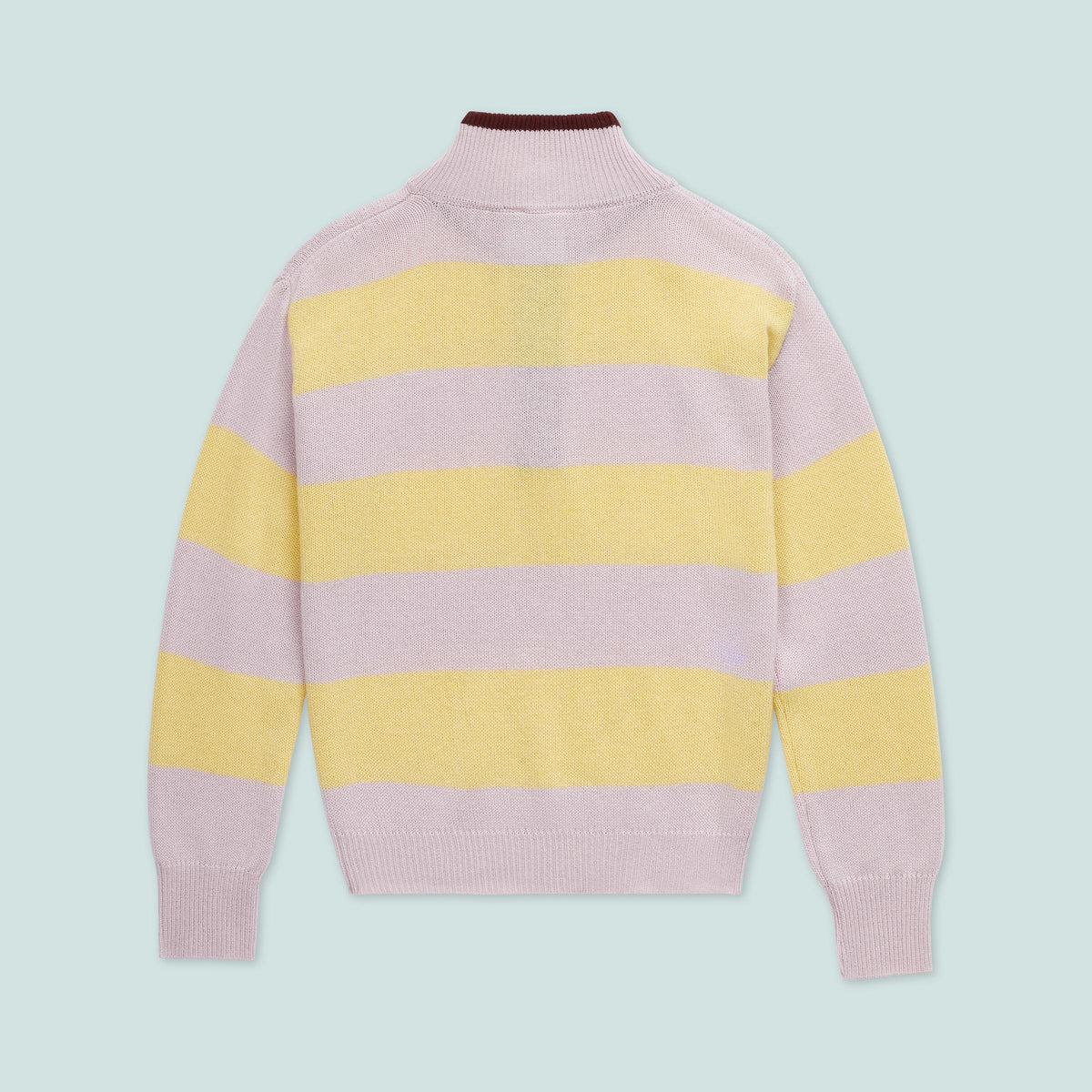Back view of The Diana in Silver Iris and Sun showcasing bold stripes and deep lava collar on a pale blue background