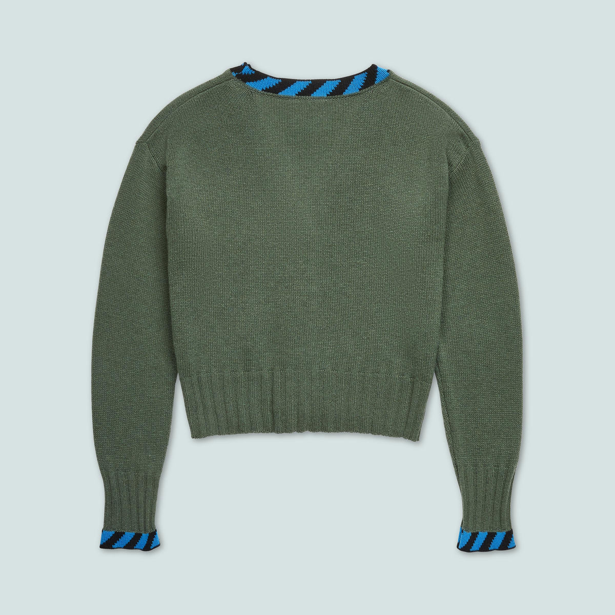 Front view of Cher Cardigan in Green showcasing contrast detailing and slightly cropped fit against a pale blue background