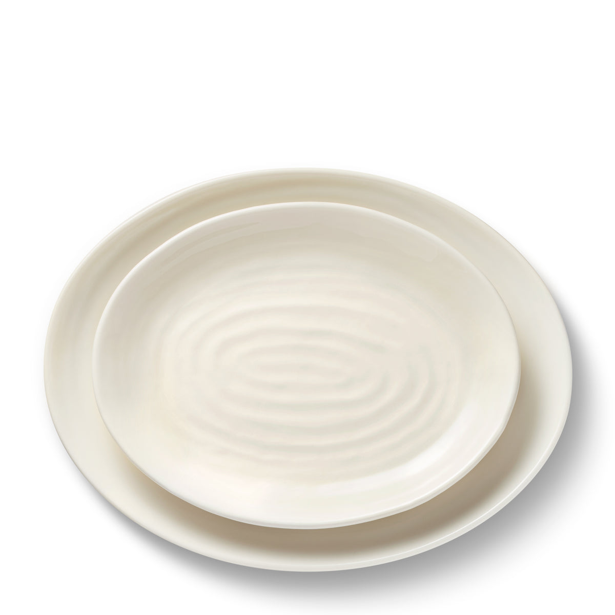 Top view of Allette Nested Dishes, Set of 2 in Cream showcasing delicate ribbing with a white background