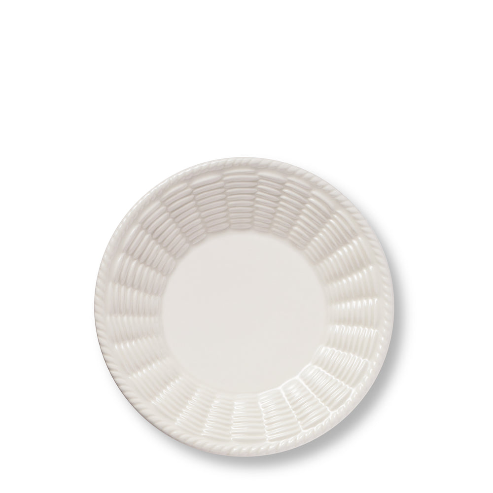 Top view of the Leta Bread Plate showcasing its artisanal textured trim inspired by rattan basketry on a white background
