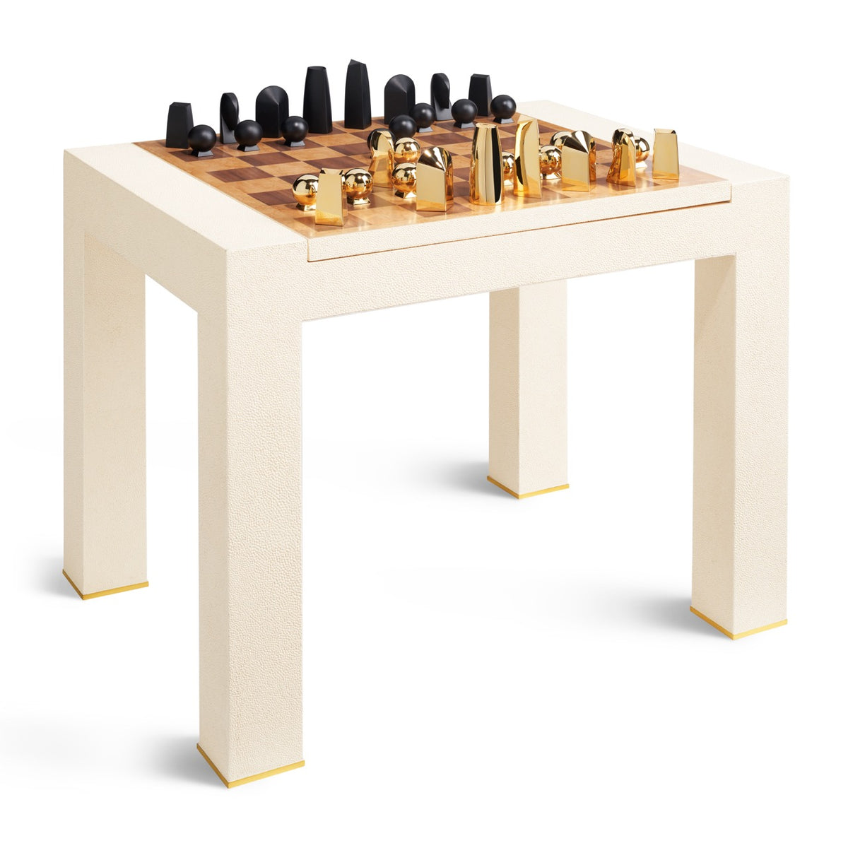 Angled view of Shagreen Chess Side Table in cream with wood chessboard, black and gold pieces and brass-trimmed legs