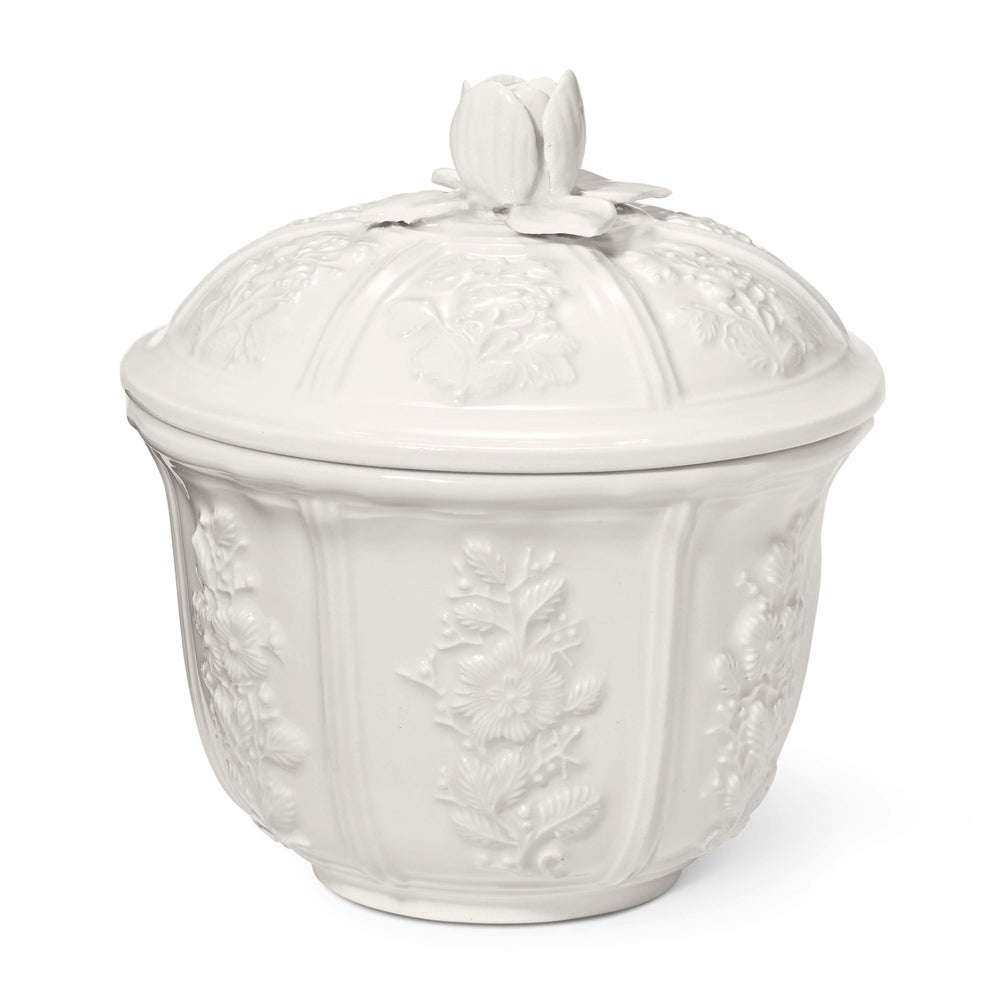 Front view of Josepha small earthenware canister showcasing raised floral relief and rose topped lid on white background