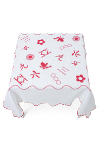 Pink & white 100% linen embroidered tablecloth that is Mahjong themed, scalloped edges - close up
