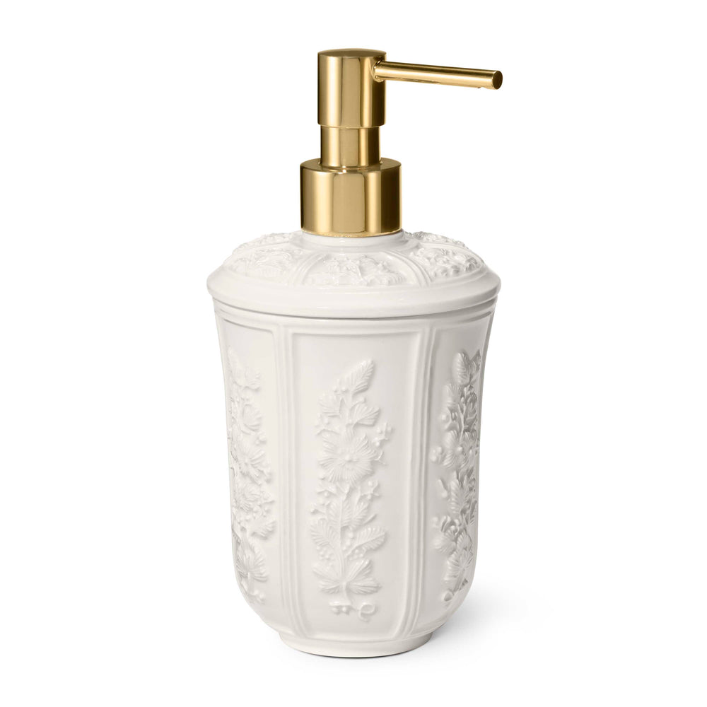 Front view of Josepha Gold Pump Dispenser showcasing white ceramic relief floral pattern and gold pump against a white background