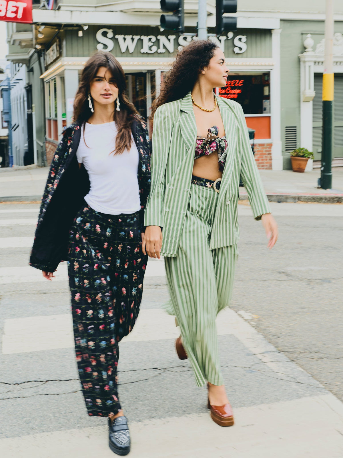 Front view of Maeve Pant in Florence Black Floral showing relaxed fit and floral checkerboard pattern on a model outdoors