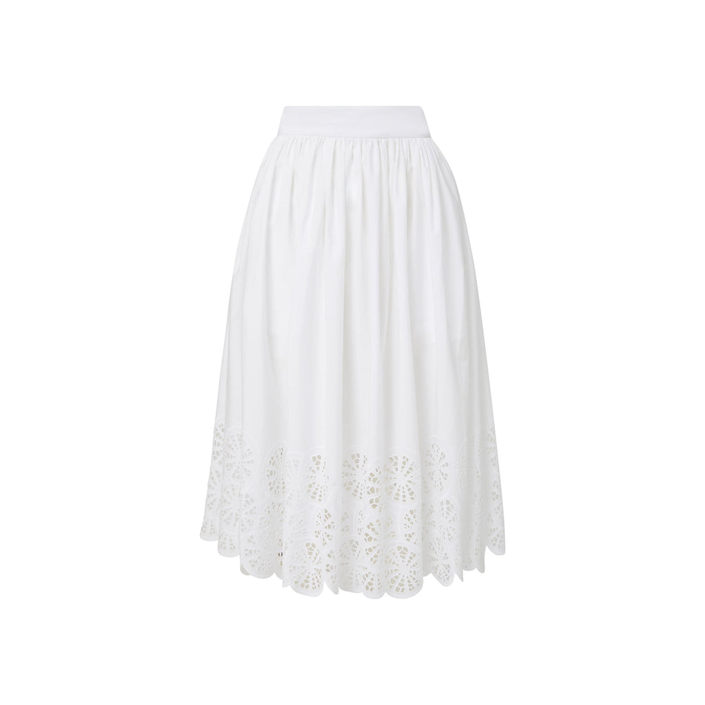 Front view of Camille skirt in lemon slice embroidered cotton showcasing gathered waist and cutwork hem on white background