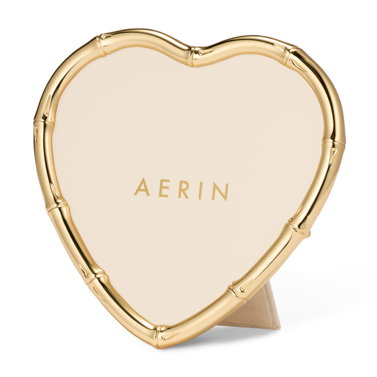 Front view of Ava bamboo heart photo frame in polished gold metal with ‘AERIN’ mat and easel back on white background