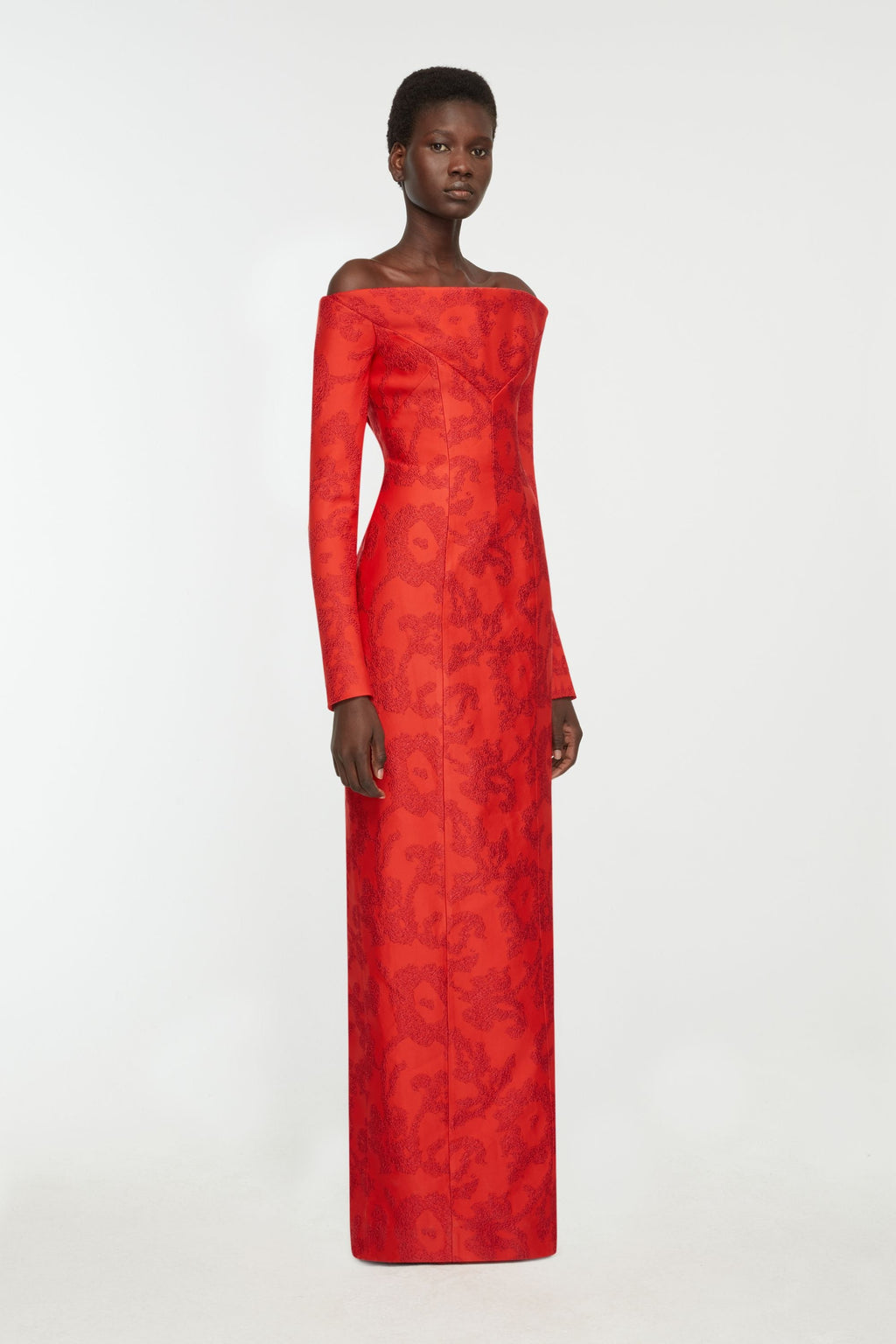 Zarith Dress In Red Boucle Floral- Full body side view 
