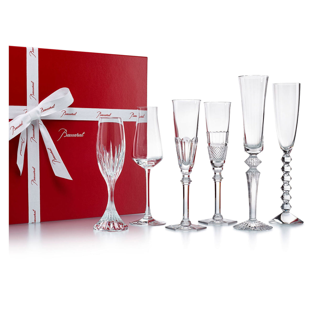 Front of Bubble Box 6 piece Baccarat champagne flutes showing six different shapes with red gift box on white background