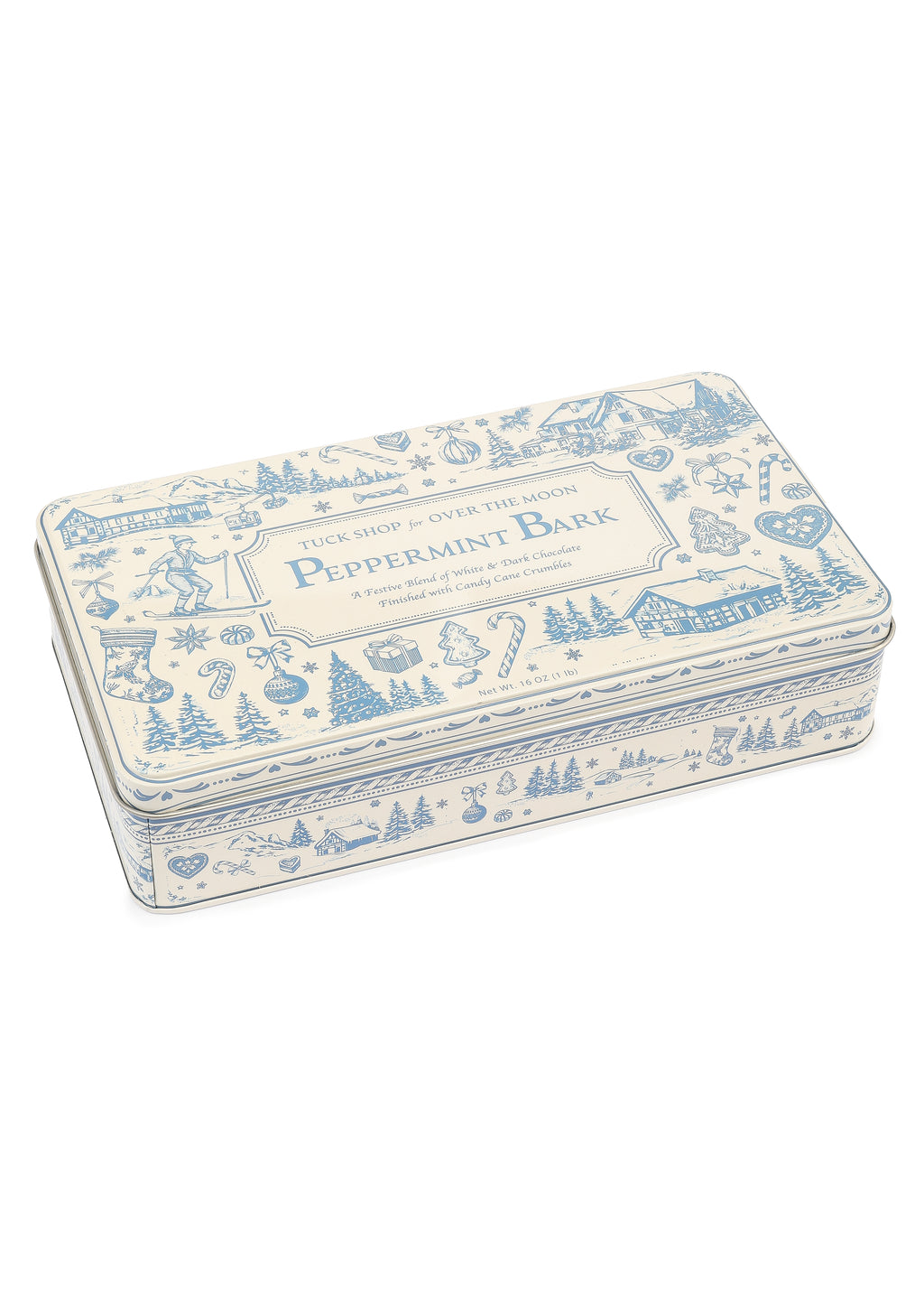 Angled view of Tuck Shop for Over The Moon Peppermint Bark showcasing a blue and white keepsake tin on a white background